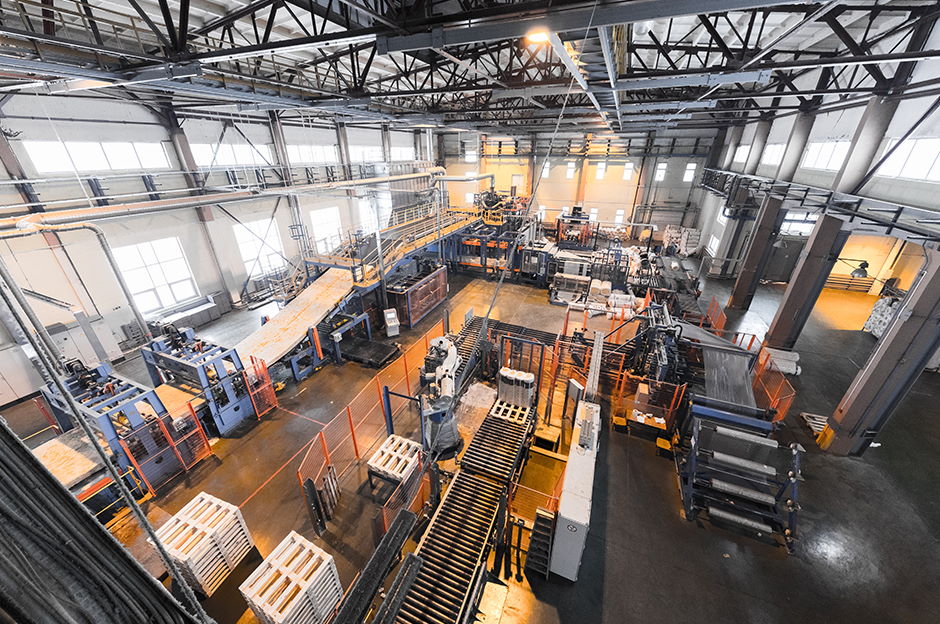 Production warehouse with pallets and tools for manufacturing